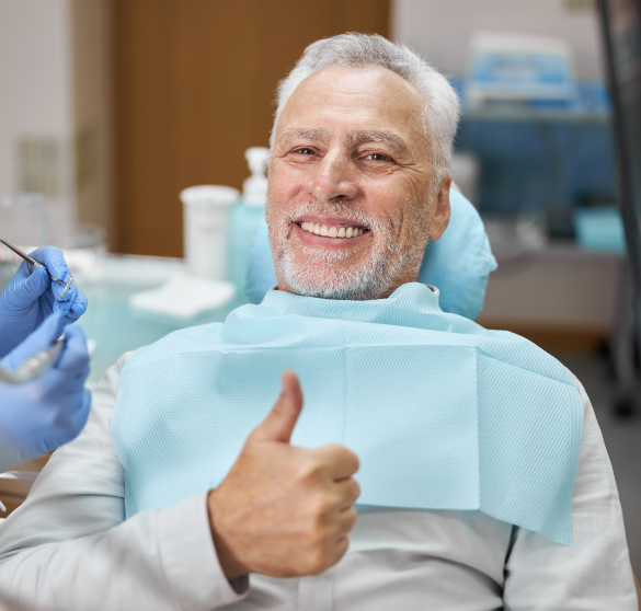 Smiling patient after dental treatment